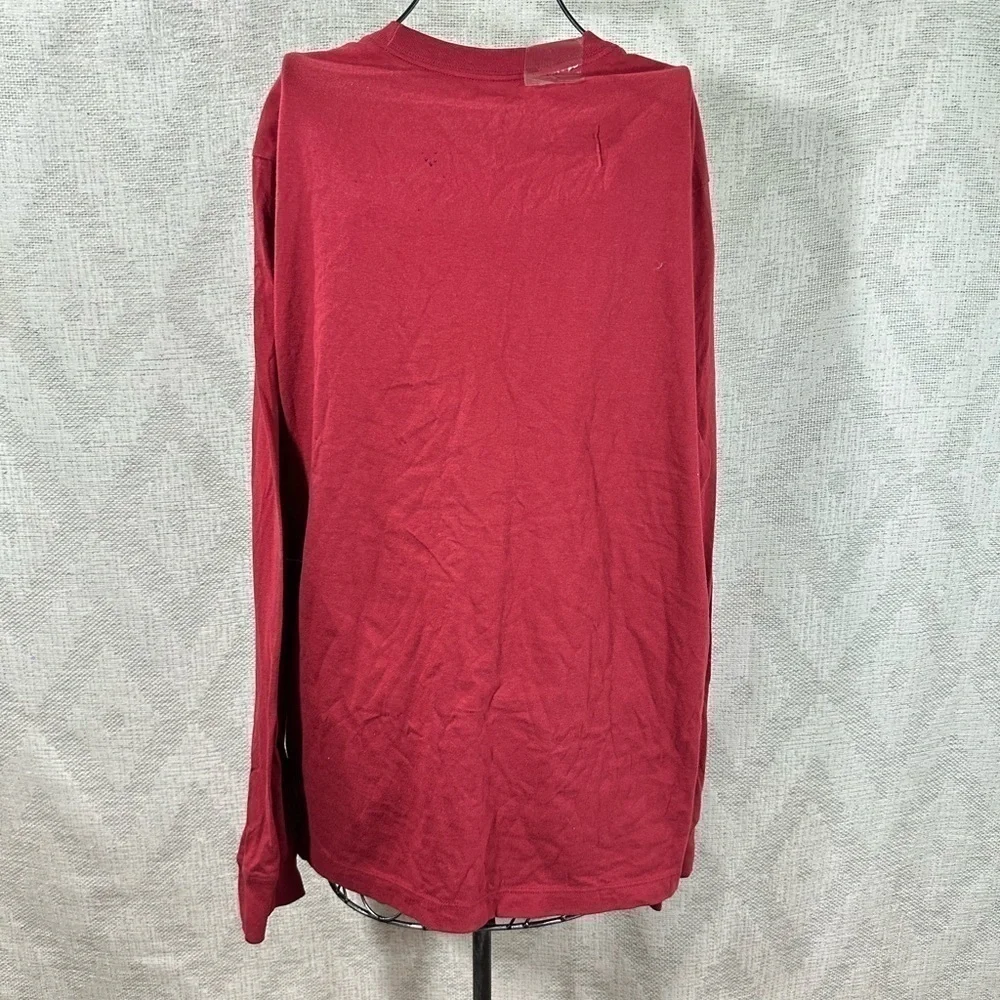The Nike Tee burgundy long sleeve with camo logo size XL